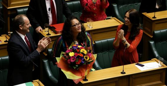 One of the NZ  MP's who co-sponsored the marriage equality bill is congratulated after its approval. 